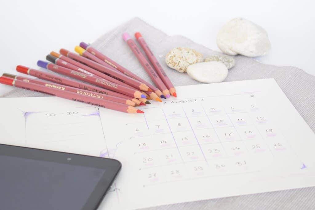 calendar planner with colored pencils