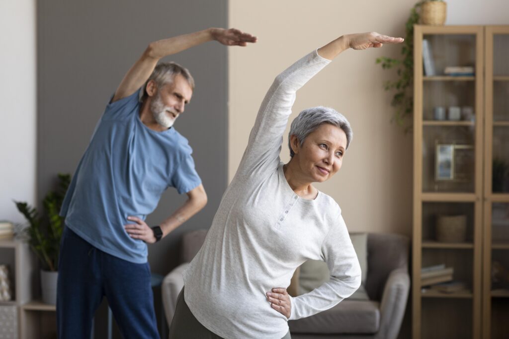 mature couple stretching for exercise and movement